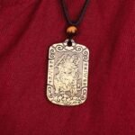 A Taoist amulet featuring Zhao Gongming riding a tiger, symbolizing good fortune and wealth.