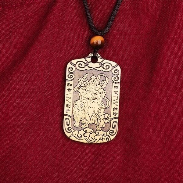 A Taoist amulet featuring Zhao Gongming riding a tiger, symbolizing good fortune and wealth.