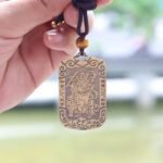 A Taoist amulet featuring Zhao Gongming riding a tiger, symbolizing good fortune and wealth.
